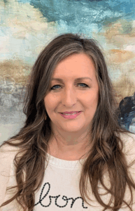 A headshot of Kim an interior designer working in Frankenmuth, Michigan for Fenton Home Furnishings.