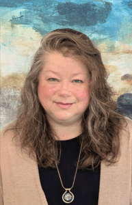 A headshot of Maria an interior designer in Waterford, Michigan working for Fenton Home Furnishings.